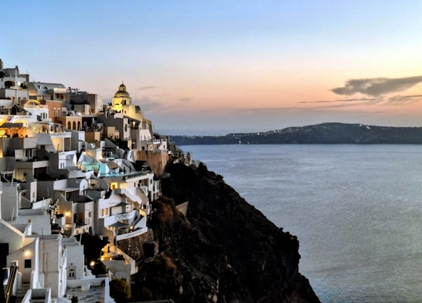 Santorini Local Holiday on May 5. What It Means for Your Day, image of Fira Town after sunset
