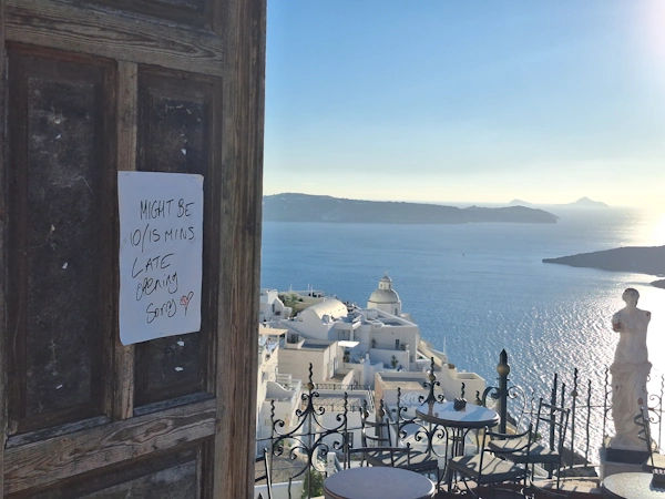 What to do in Santorini on May 5: image of PK Bar in Fira with its iconic Venus statue